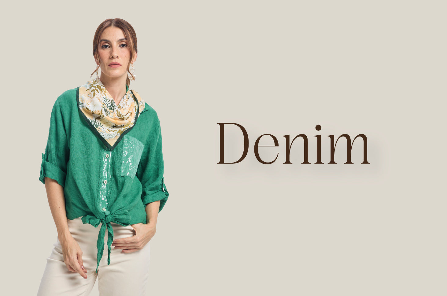 Woman in green blouse with floral scarf and cream pants next to 'Denim' text on beige background.