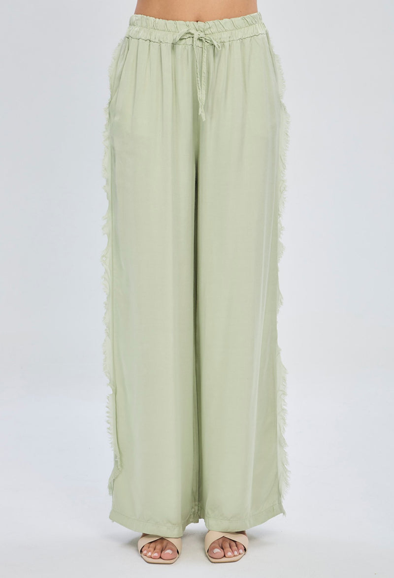 Pantalón palazzo verde menta con flecos laterales en lino para mujer BYBLA