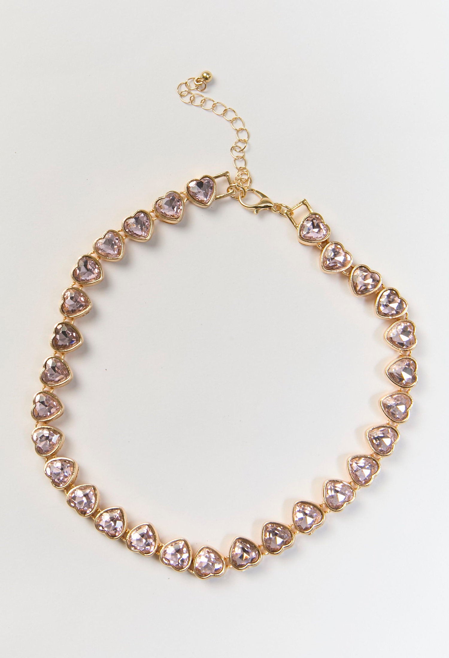 Collar tennis dorado con dije de corazon central y circonias cubicas