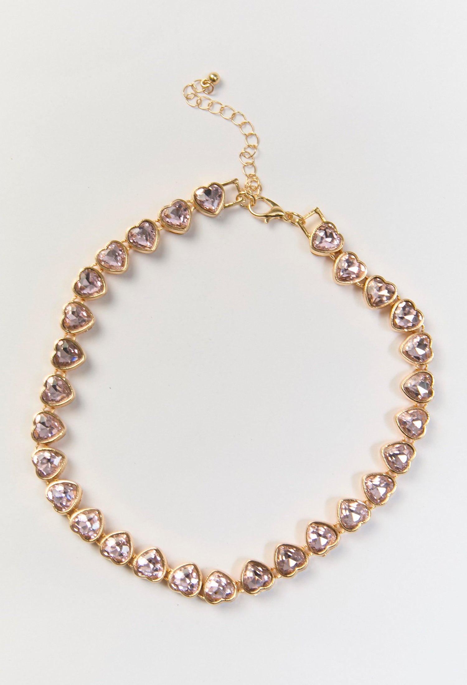 Collar tennis dorado con dije de corazon central y circonias cubicas - vista 2