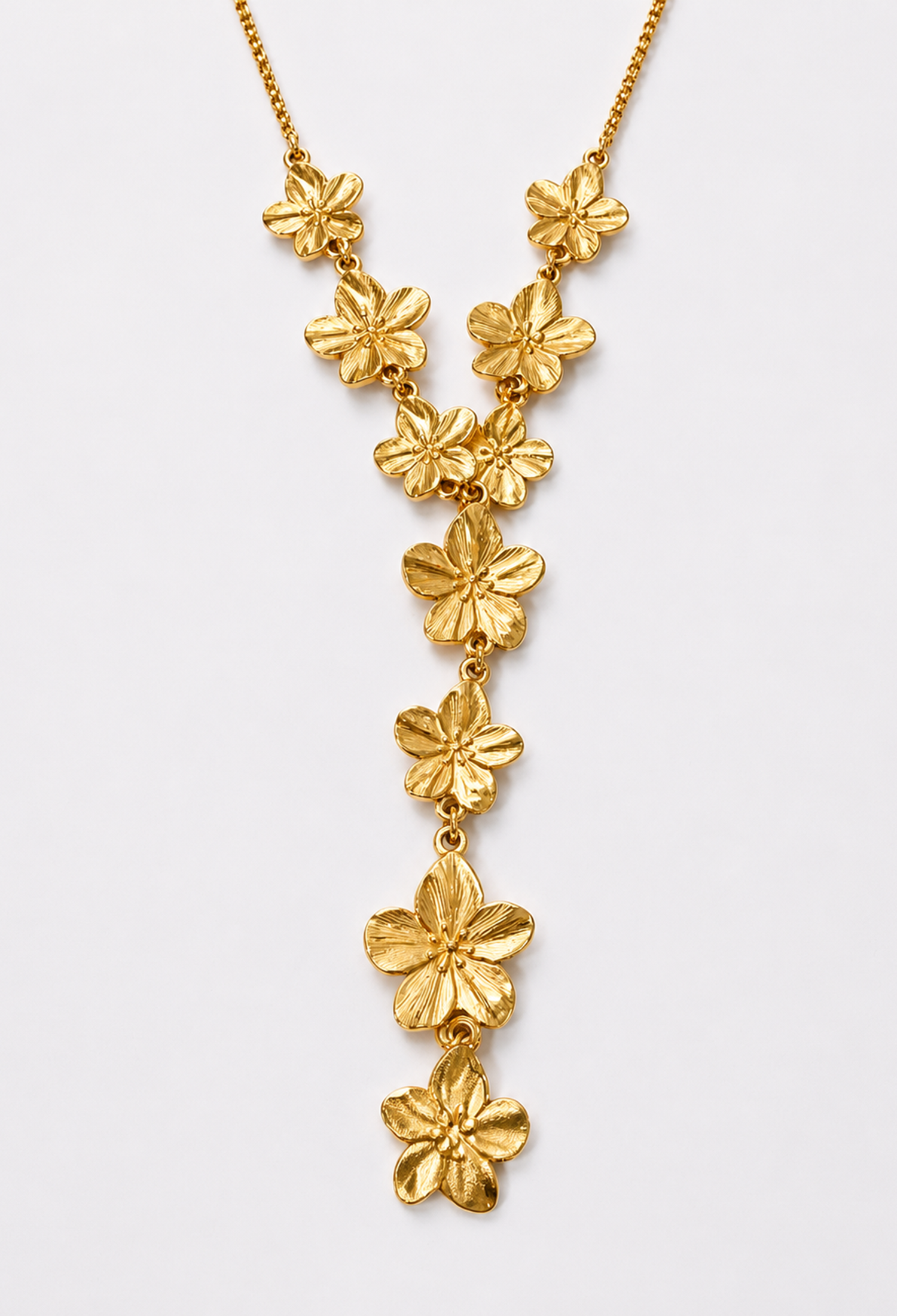 Collar en Y dorado con flores en relieve descendiendo en cascada - vista 2