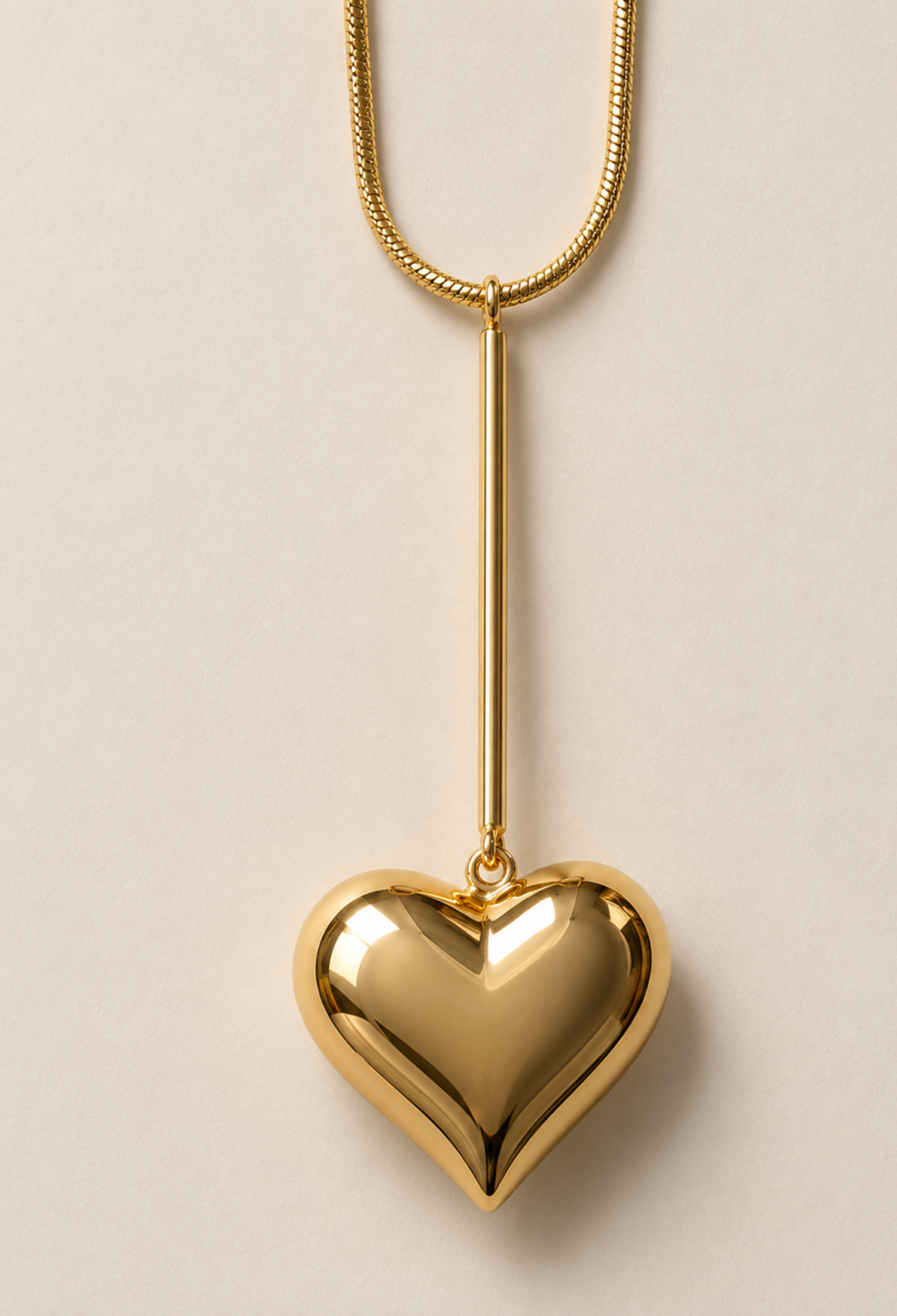Collar largo dorado con barra y dije de corazón voluminoso - vista 2