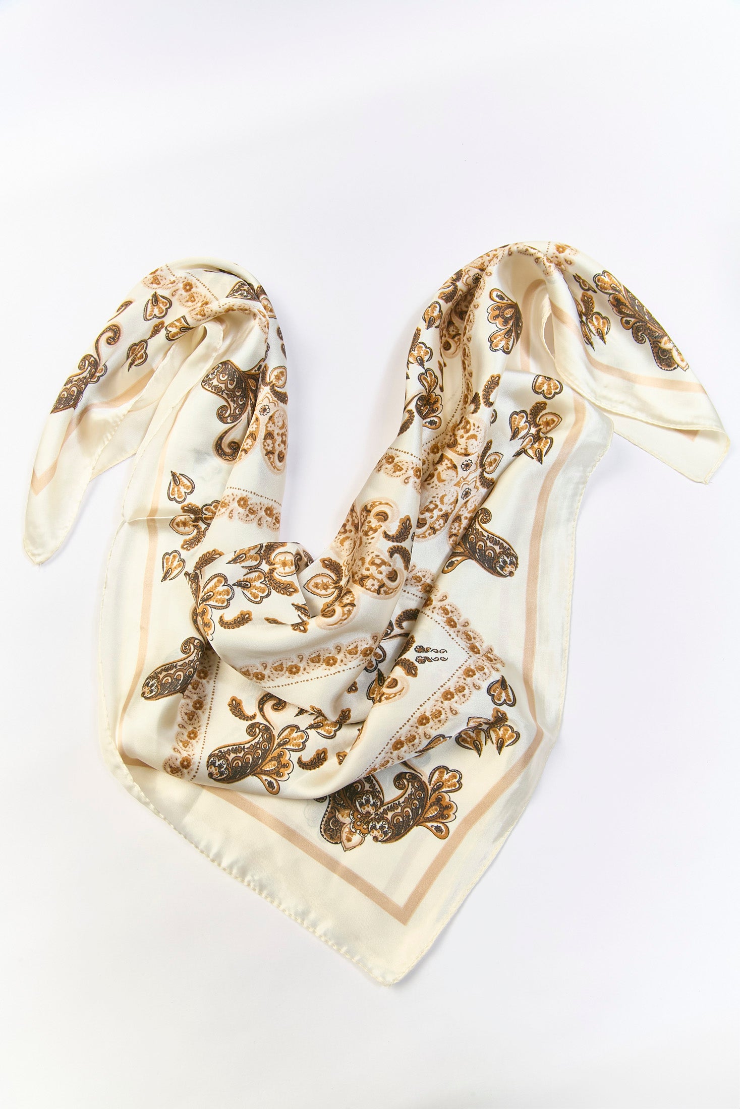 Pañoleta multiuso beige con estampado geométrico