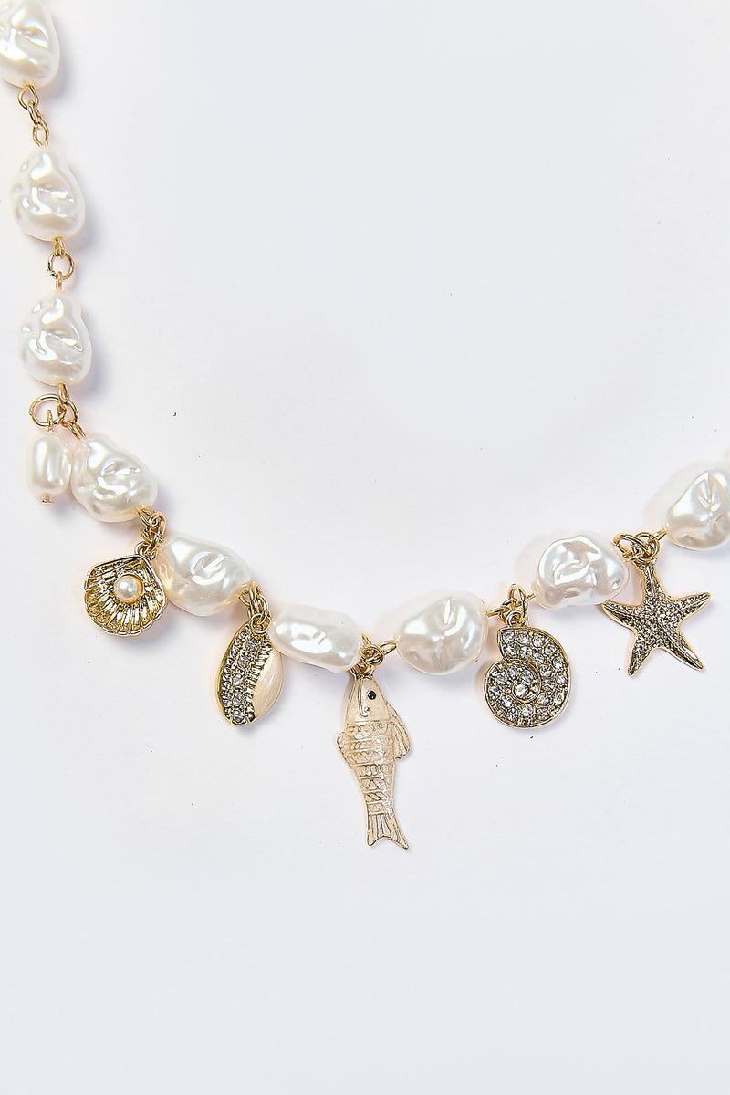 Collar dorado con multiples dijes de vida marina y perla sintetica - vista 2
