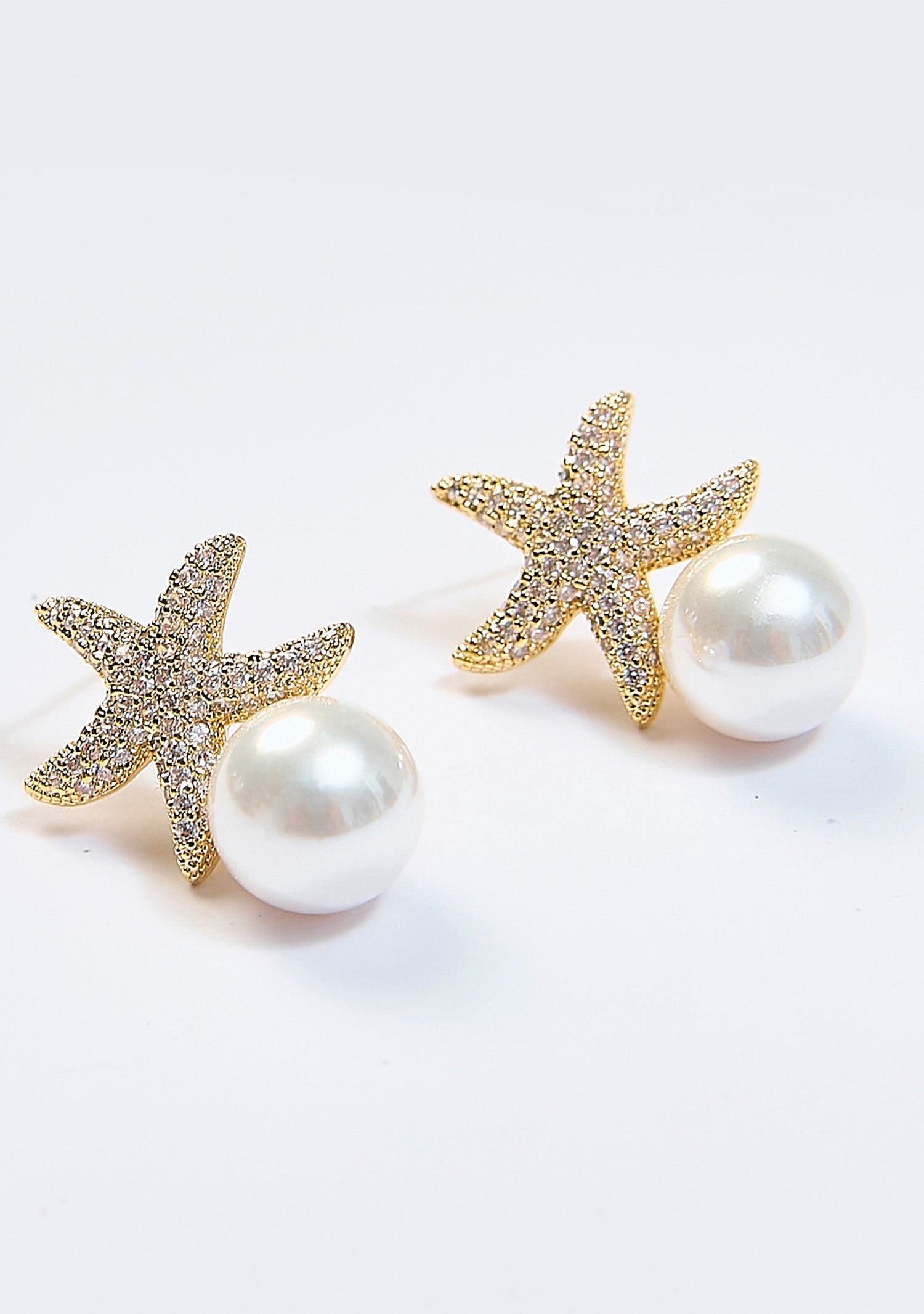 Aretes Colgantes Estrella de Mar Perla Dorados