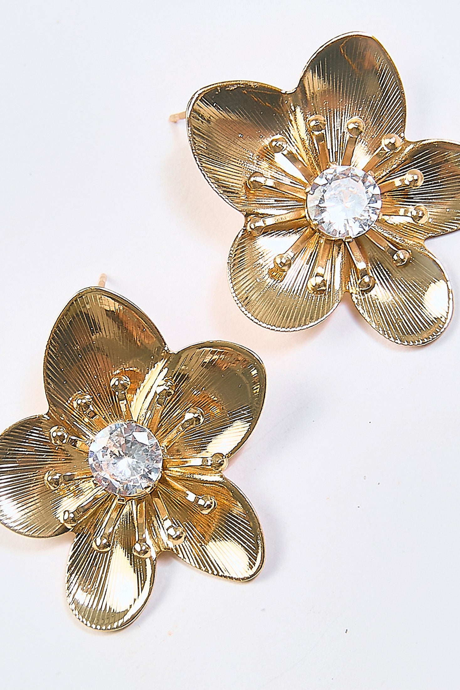 Aretes Topo Flor Metálica Dorados