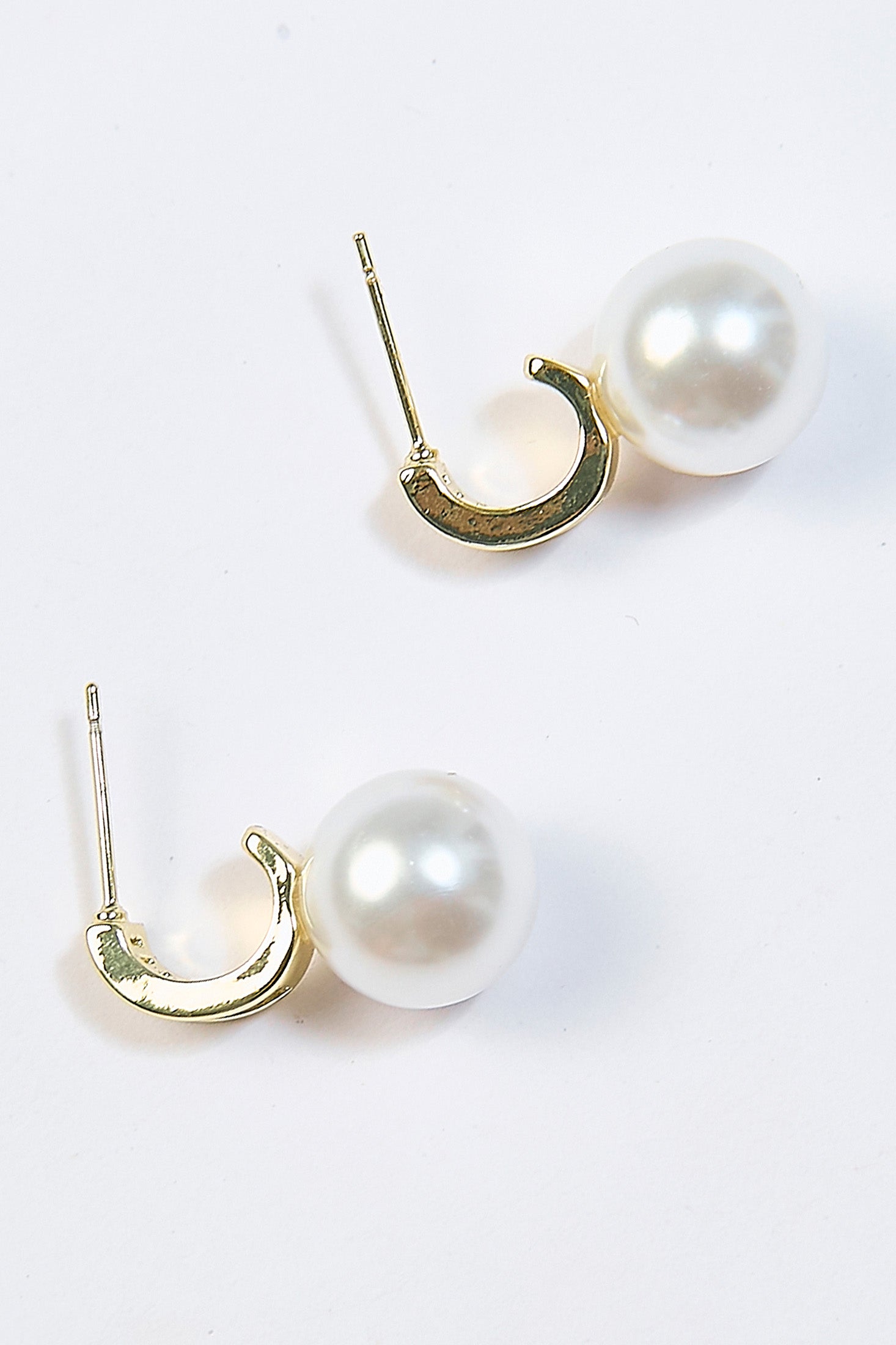 Aretes Baguette CZ con Perla Dorados