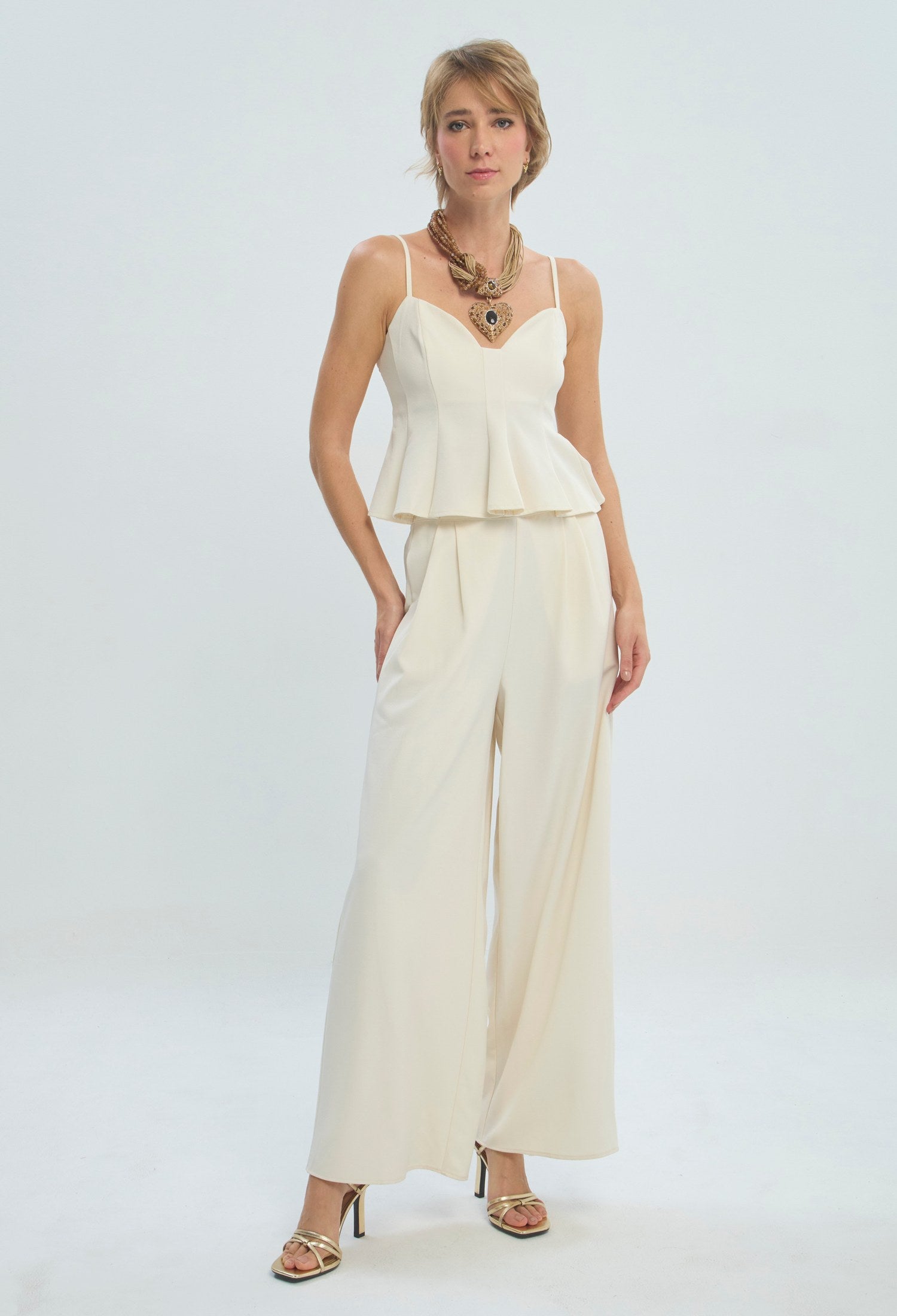 Conjunto crudo de blusa peplum con escote corazón y pantalón palazzo BYBLA - vista 2