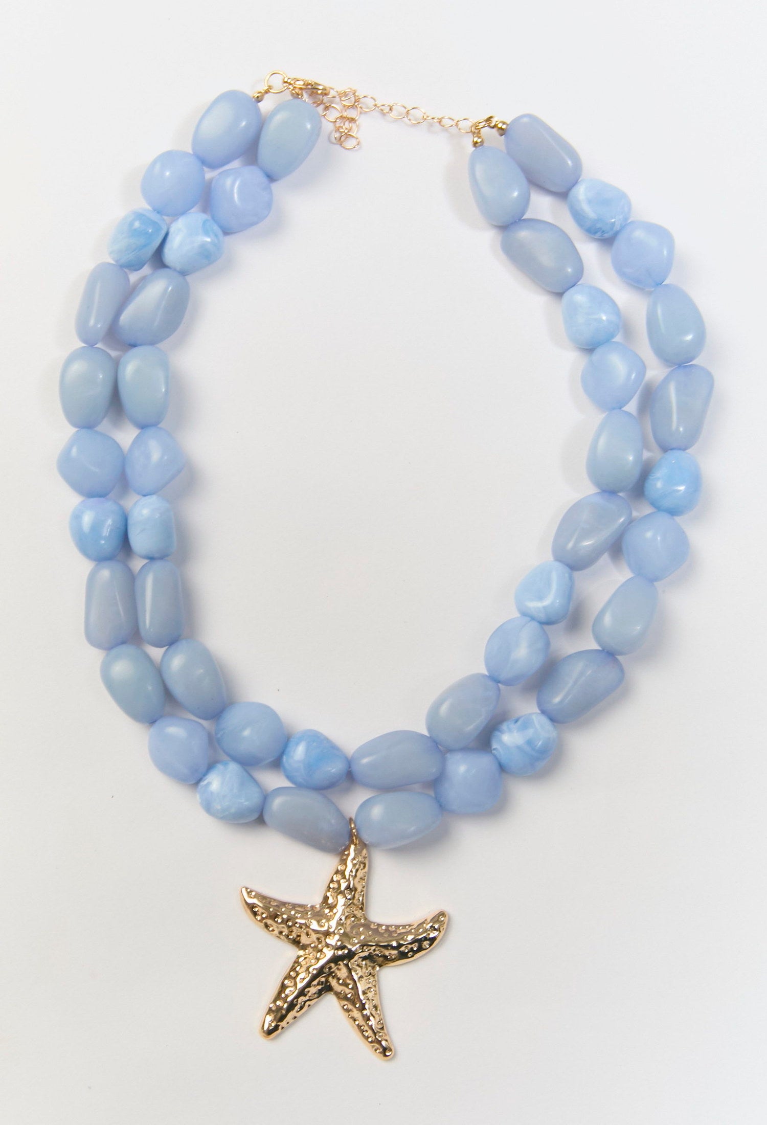 Collar multicapas azul con cuentas y dije de estrella de mar