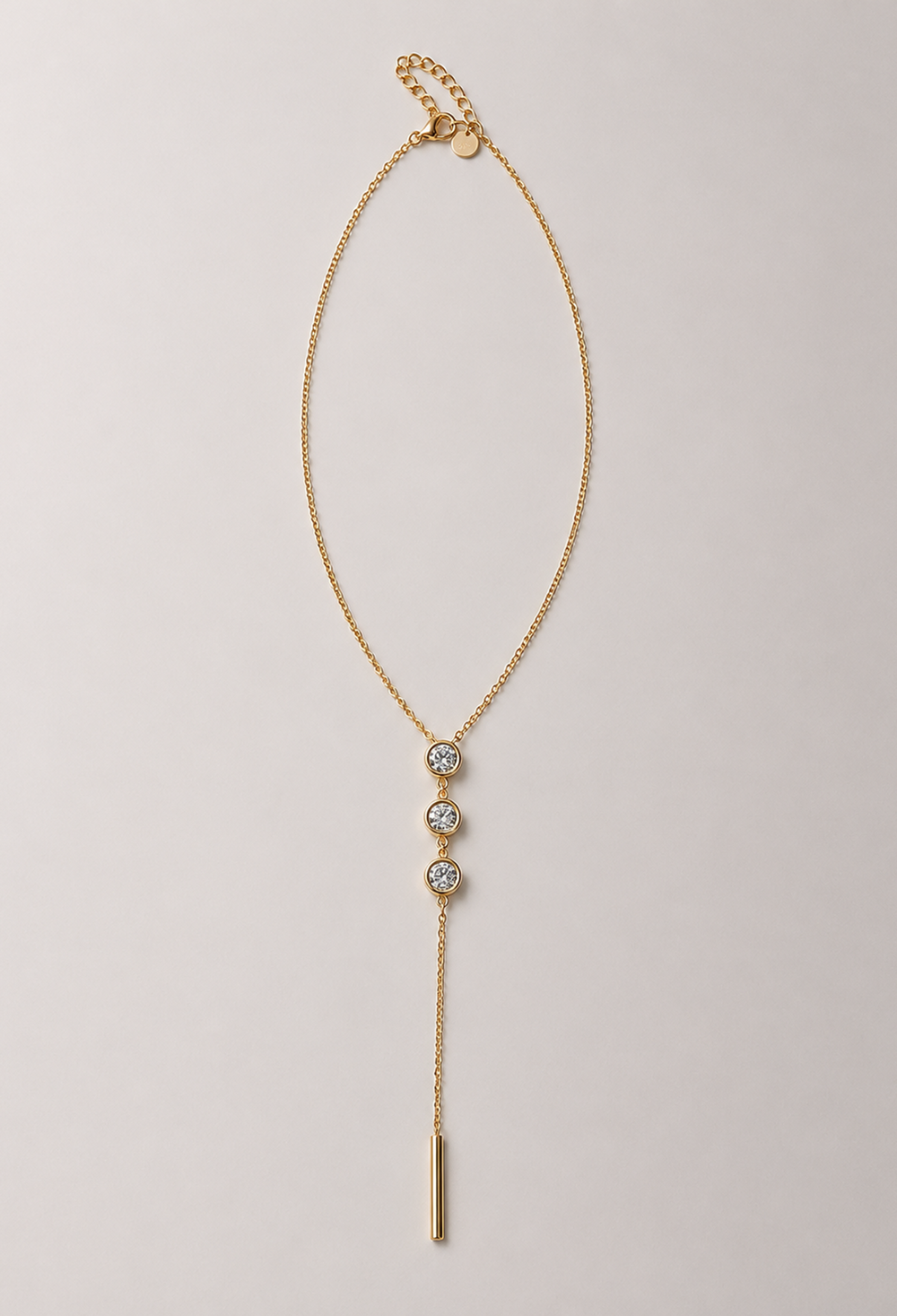 Collar dorado en Y con tres cristales y barra colgante