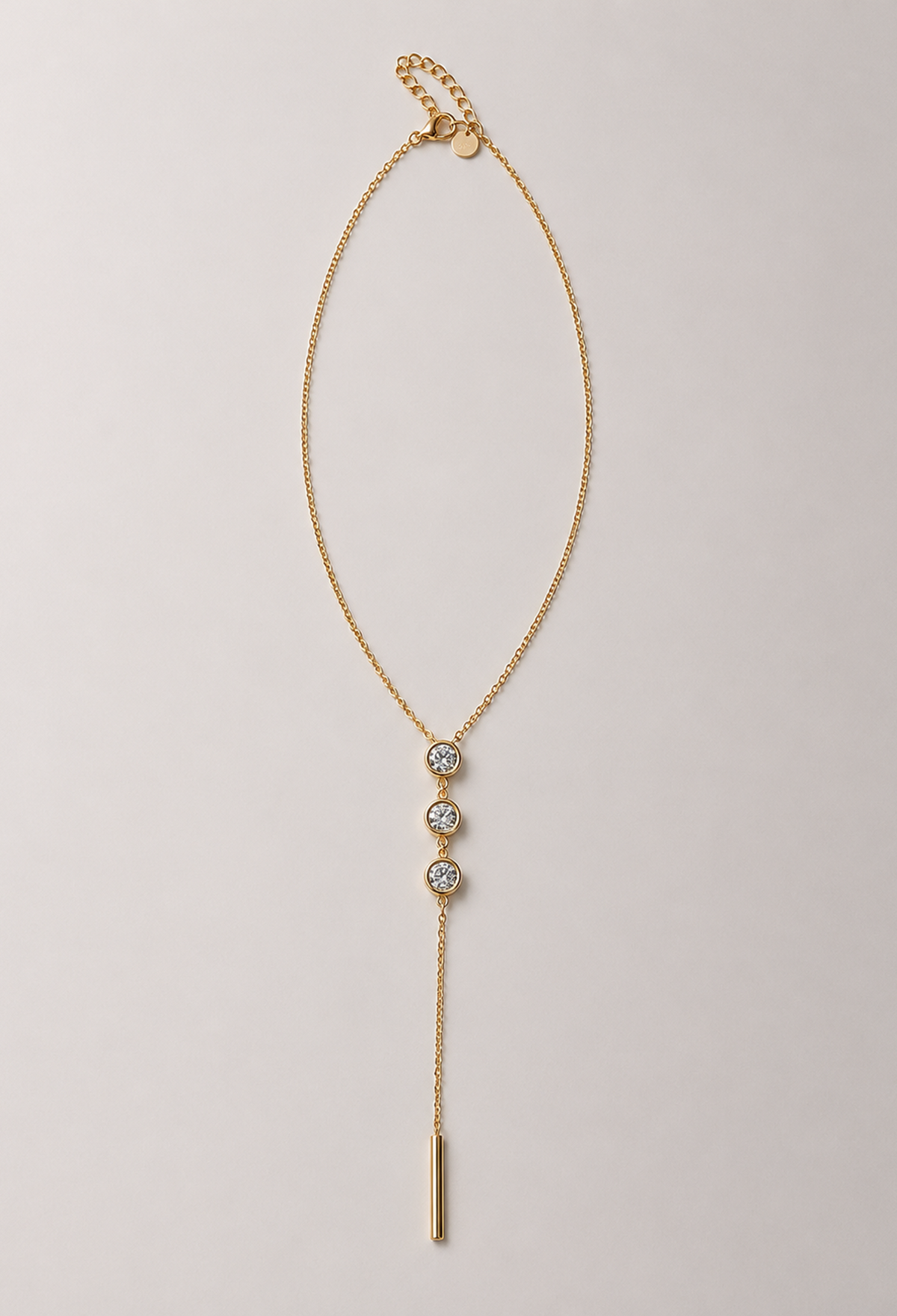 Collar dorado en Y con tres cristales y barra colgante