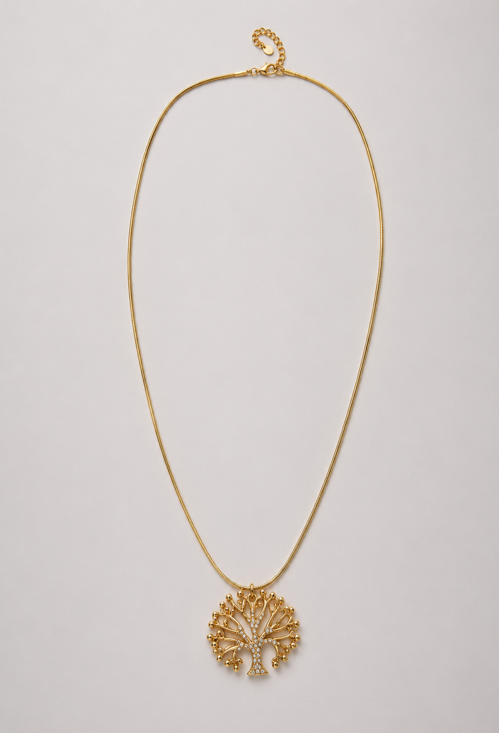 Collar dorado con dije de árbol de la vida en cristales