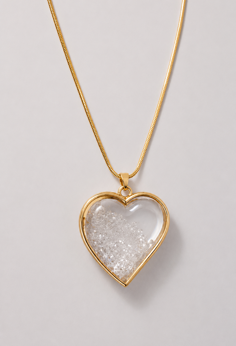 Collar con dije de corazón transparente relleno de cristales, en dorado o plateado - Dorados - vista 2