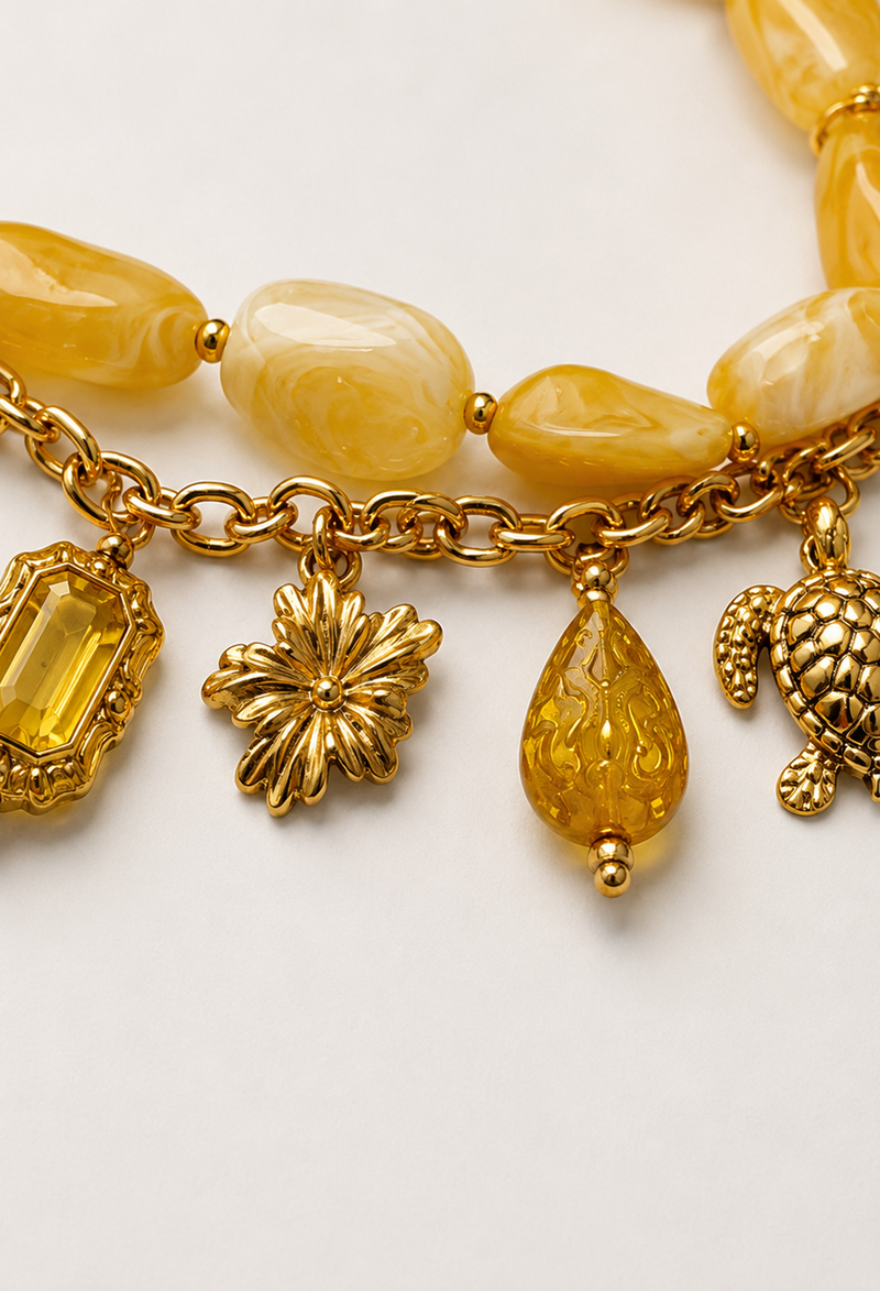 Collar statement de piedras marmoladas con cadena y dijes dorados de sol, estrella de mar y tortuga - Dorados - vista 2