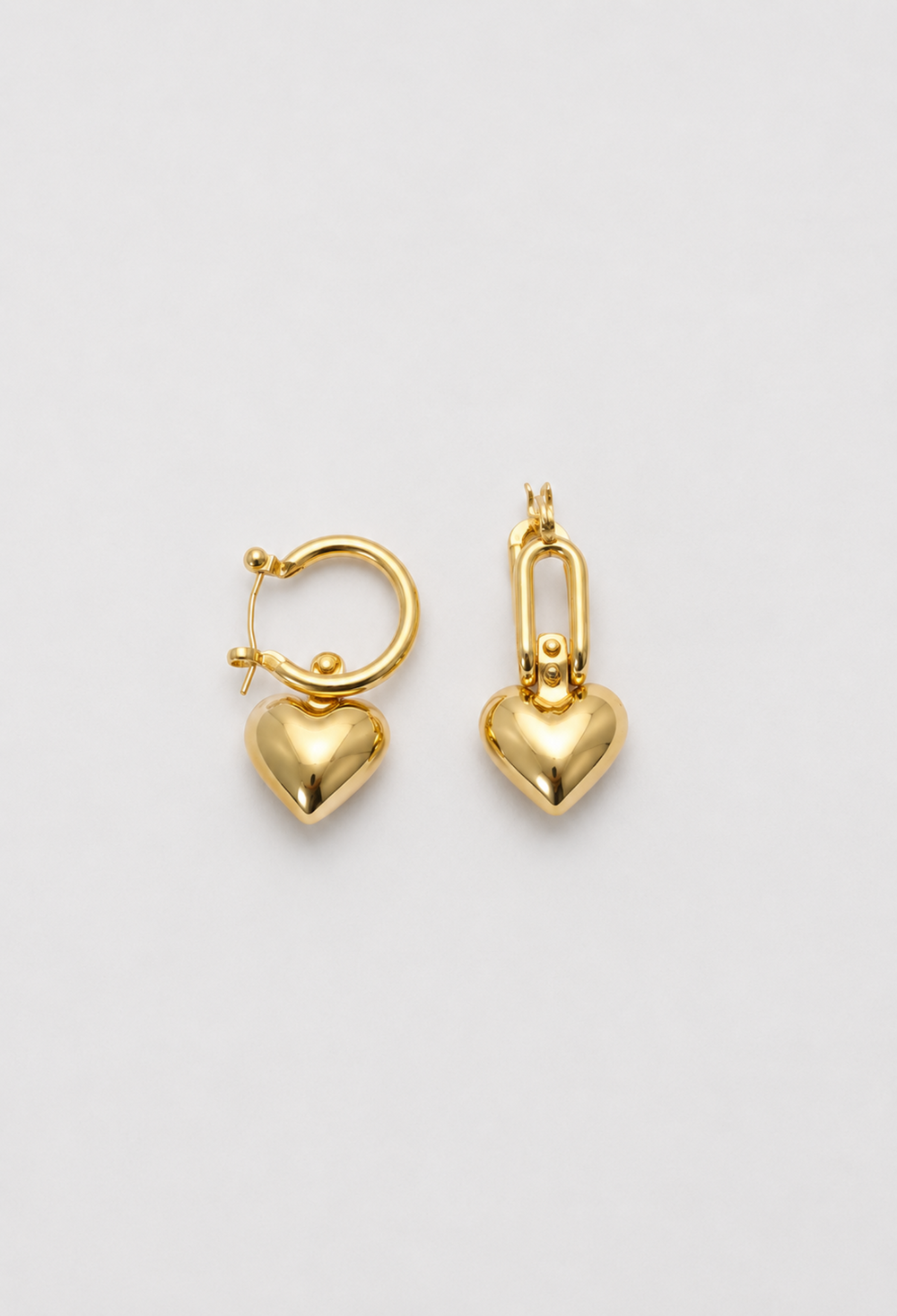 Aretes argolla con corazón dorado colgante BYBLA