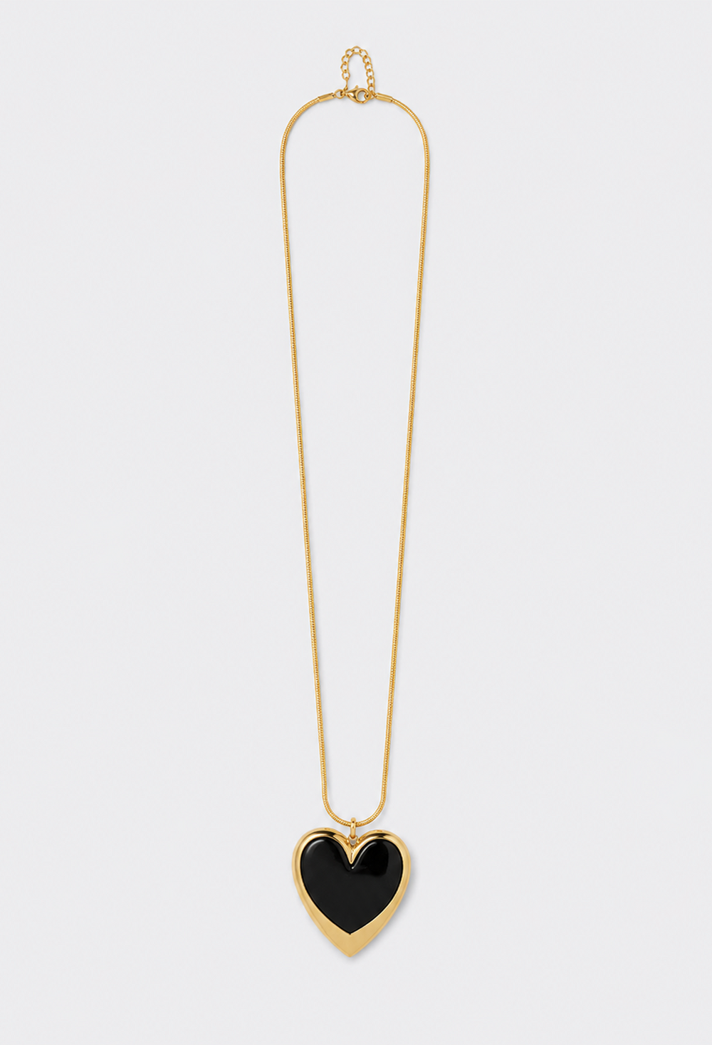 Collar largo dorado con corazón grande de resina, en negro o fucsia marmolado