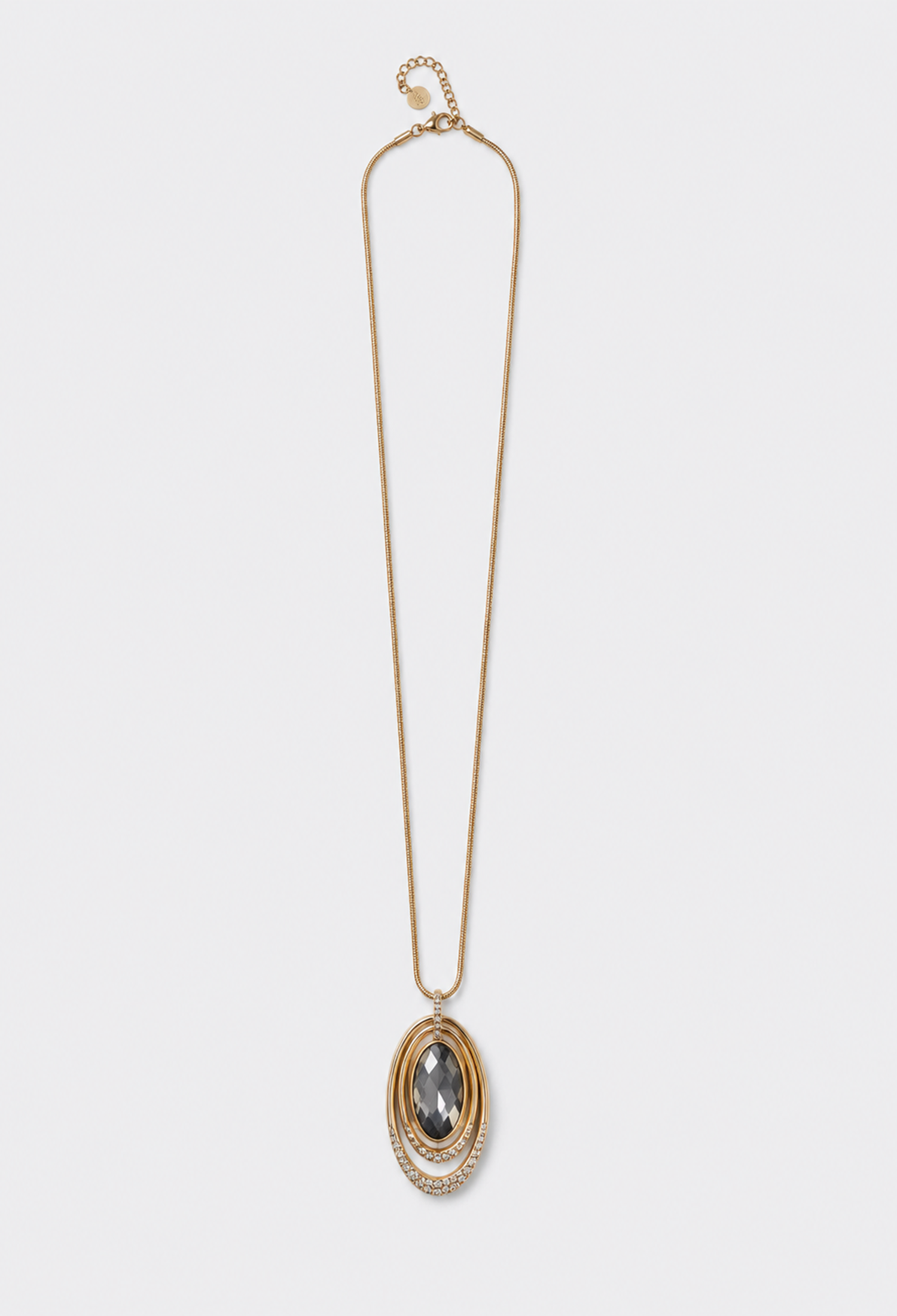 Collar largo dorado con óvalos de pedrería y cristal gris humo