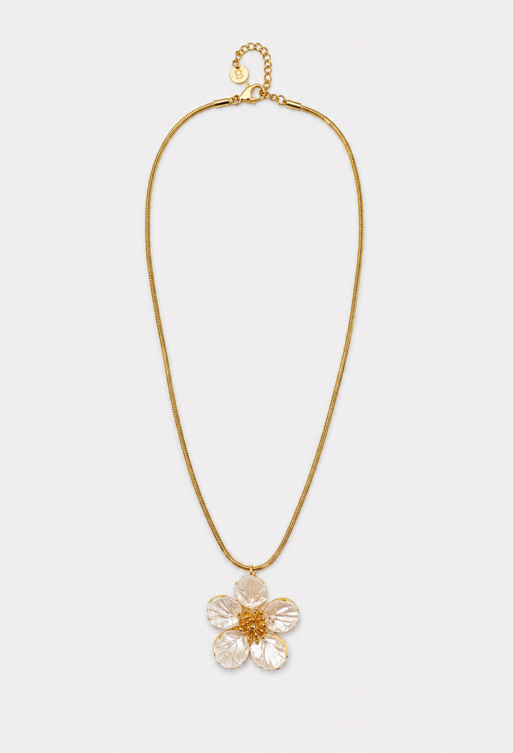 Collar dorado con flor grande efecto nácar y centro de estambres dorados