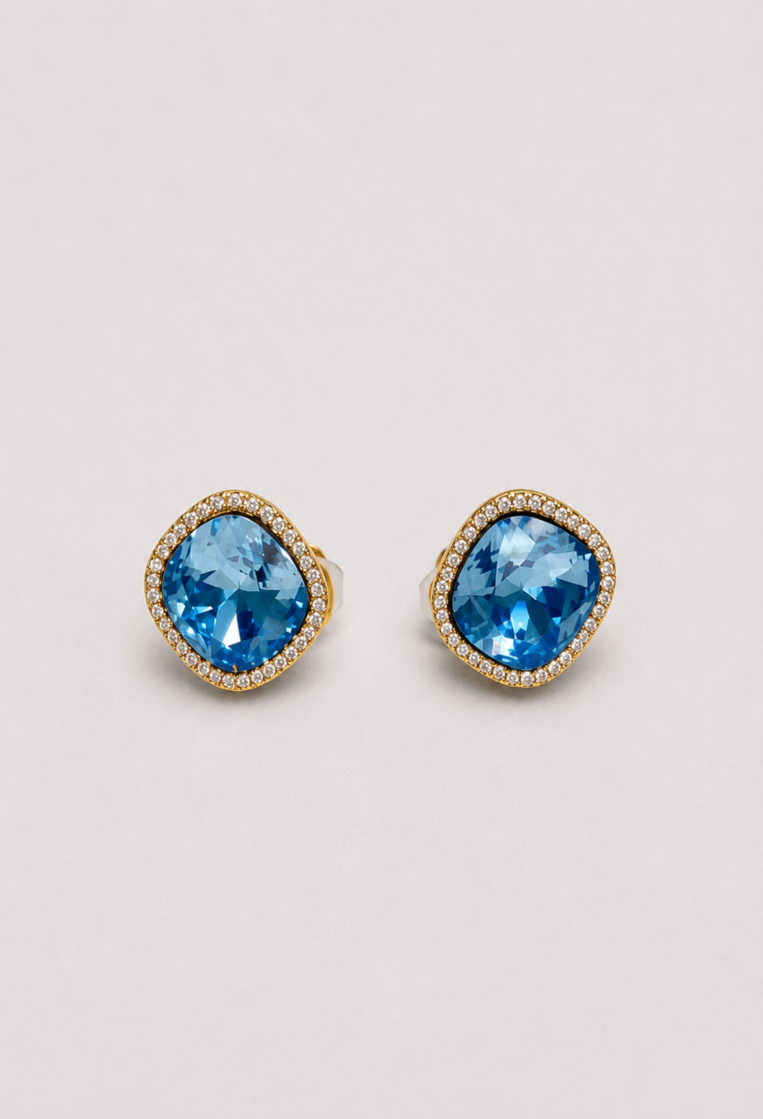 Aretes Topo Cristal Azul con Halo Dorado BYBLA