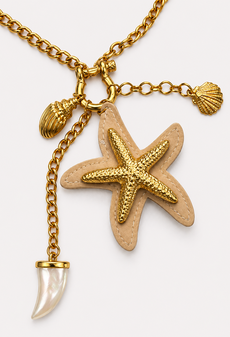 Collar dorado con estrella de mar, conchas y colmillo nacarado - vista 2