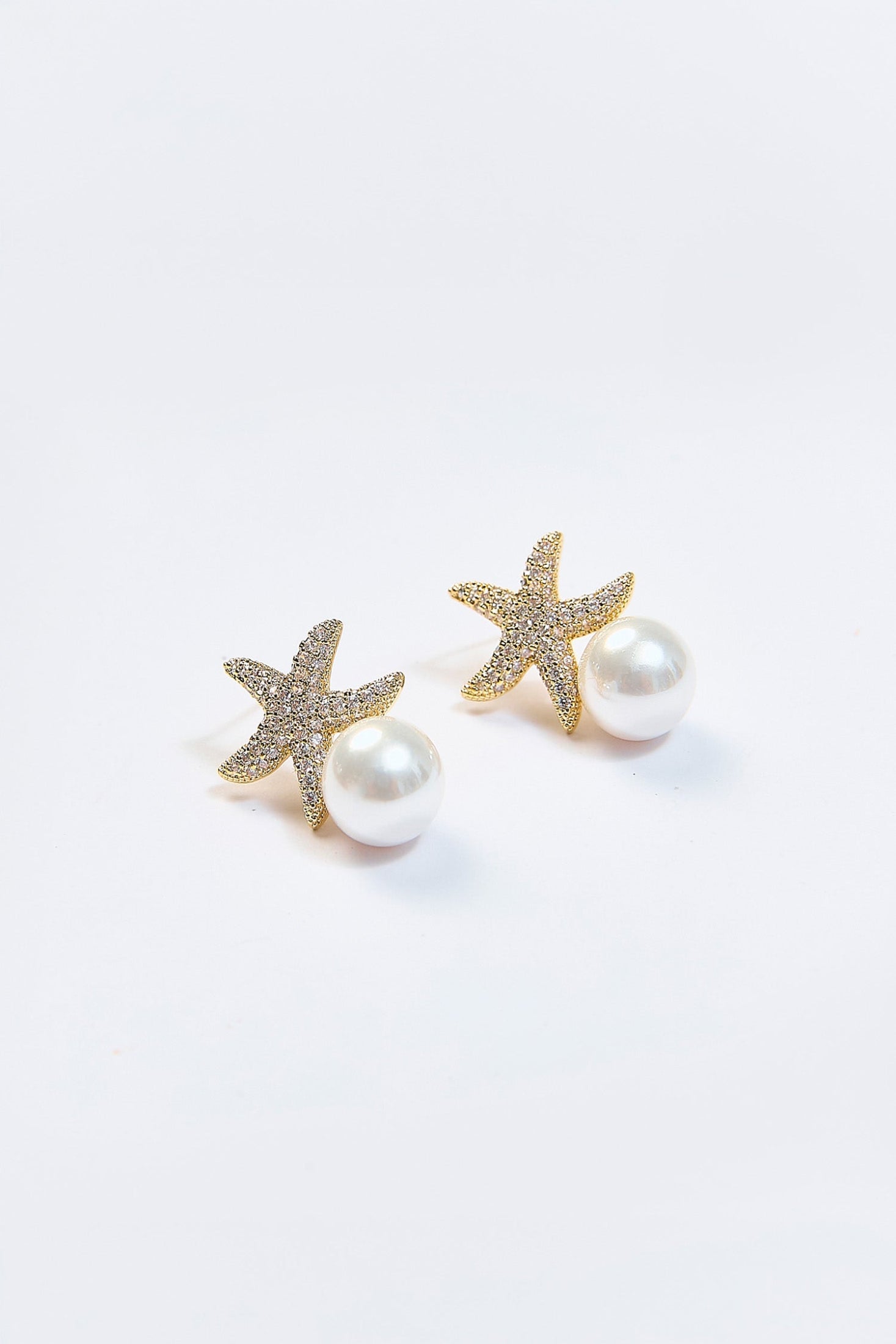 Aretes Colgantes Estrella de Mar Perla Dorados