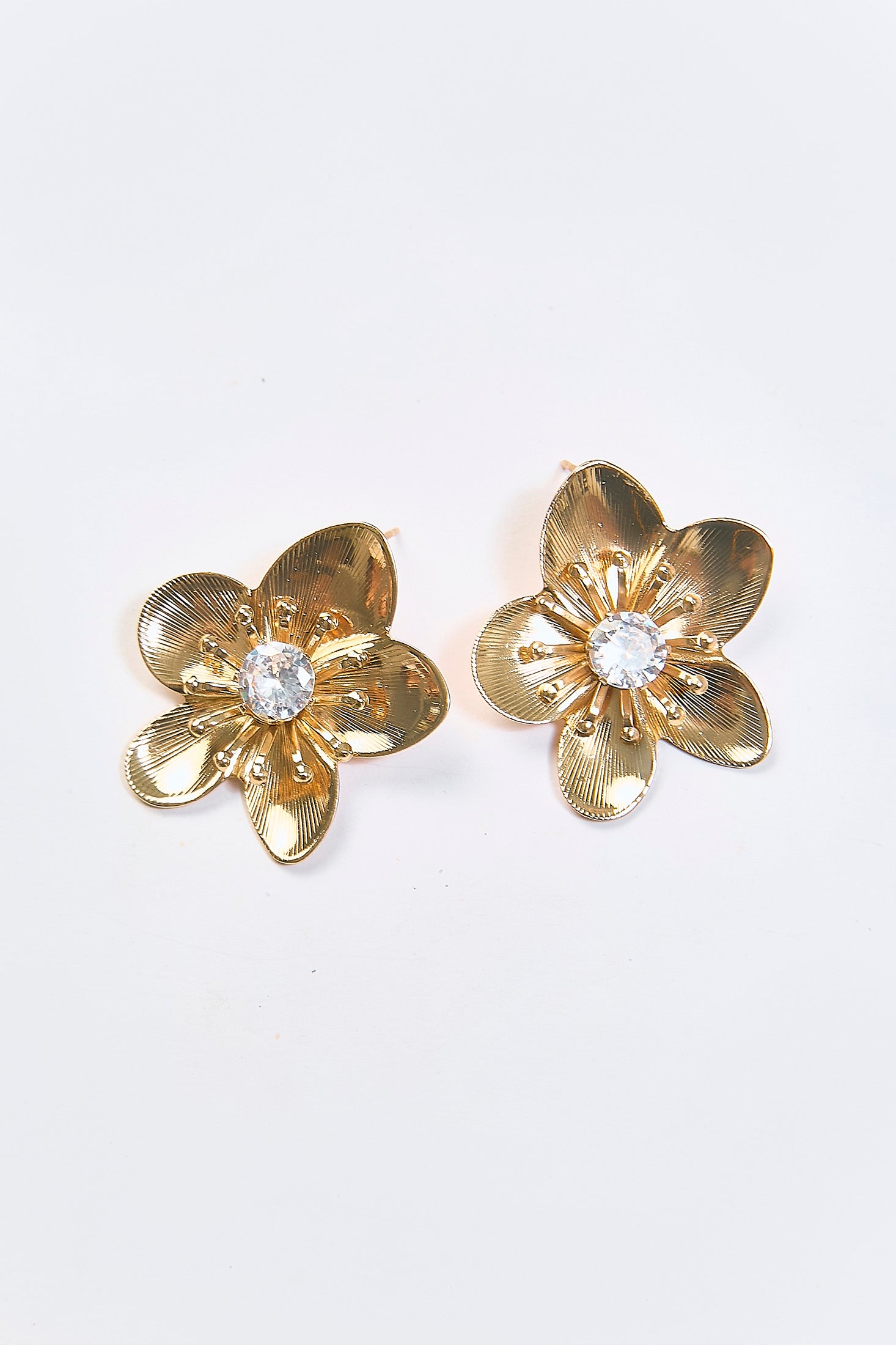 Aretes Topo Flor Metálica Dorados