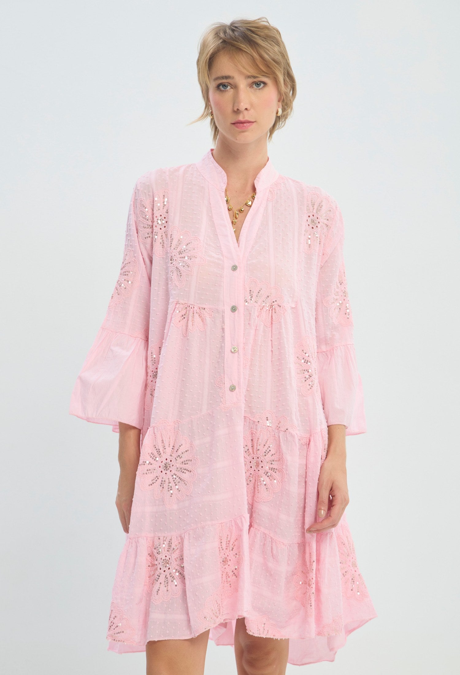 Vestido corto rosa en lino con bordado calado BYBLA